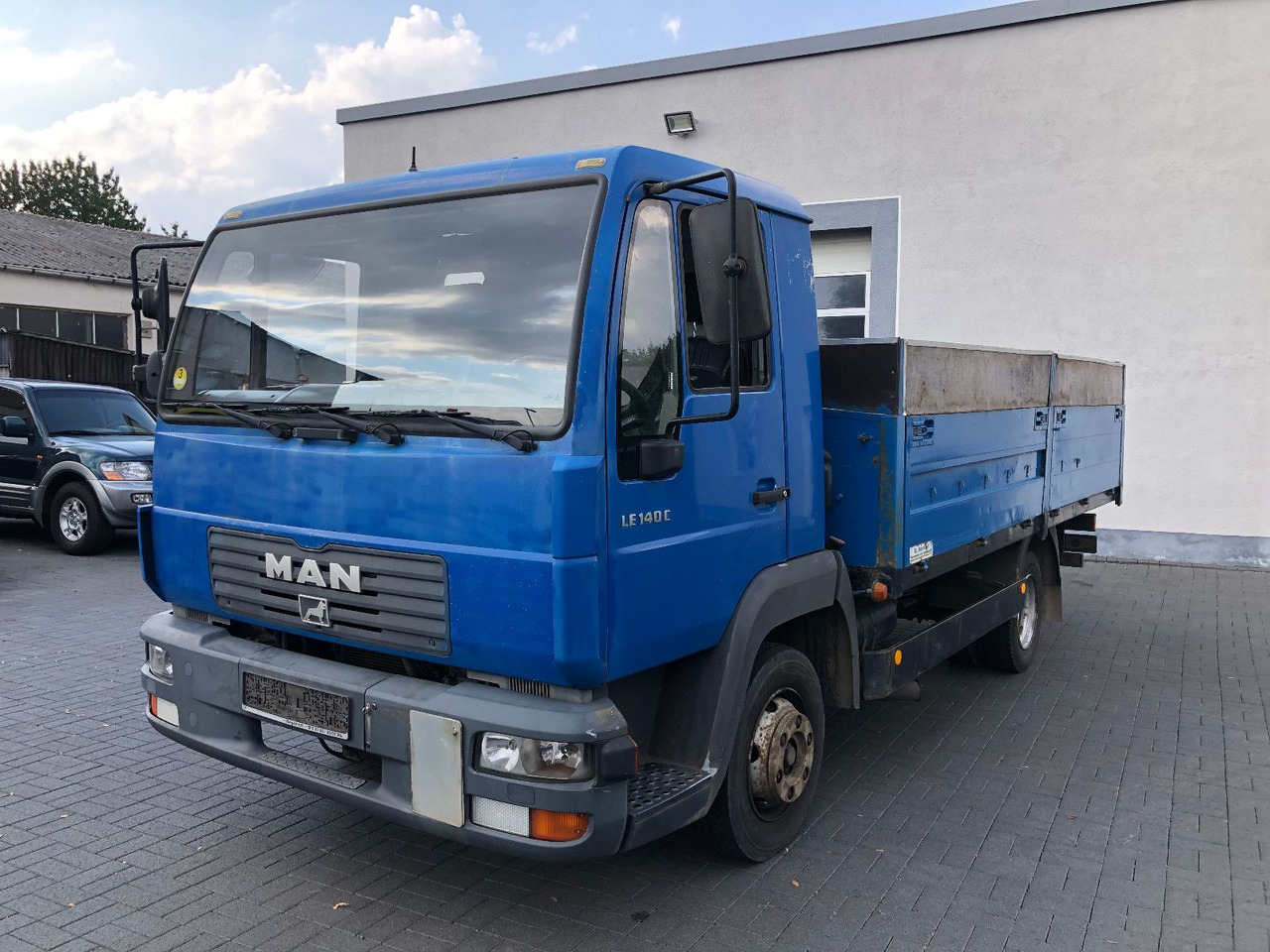 MAN LE 140 C Klima, Tempomat, TÜV 11-2025 - Open body delivery van: picture 1 MAN LE 140 C Klima, Tempomat, TÜV 11-2025 - Open body delivery van: picture 1