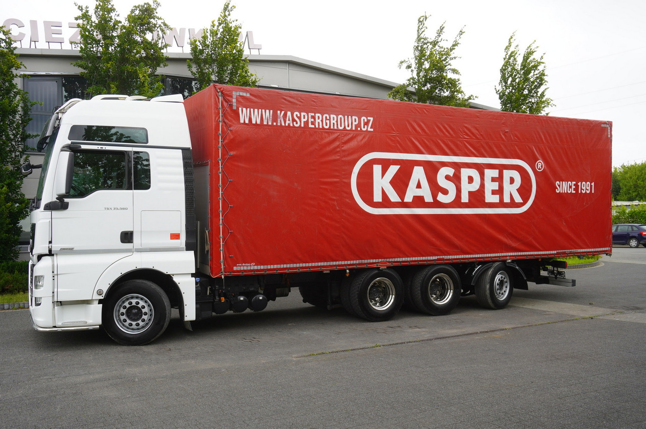 MAN MAN TGX 35.580 E6 8x4 /4 / 23 EPAL tarp superstructure / 4th axle steered - Curtainsider truck: picture 2 MAN MAN TGX 35.580 E6 8x4 /4 / 23 EPAL tarp superstructure / 4th axle steered - Curtainsider truck: picture 2