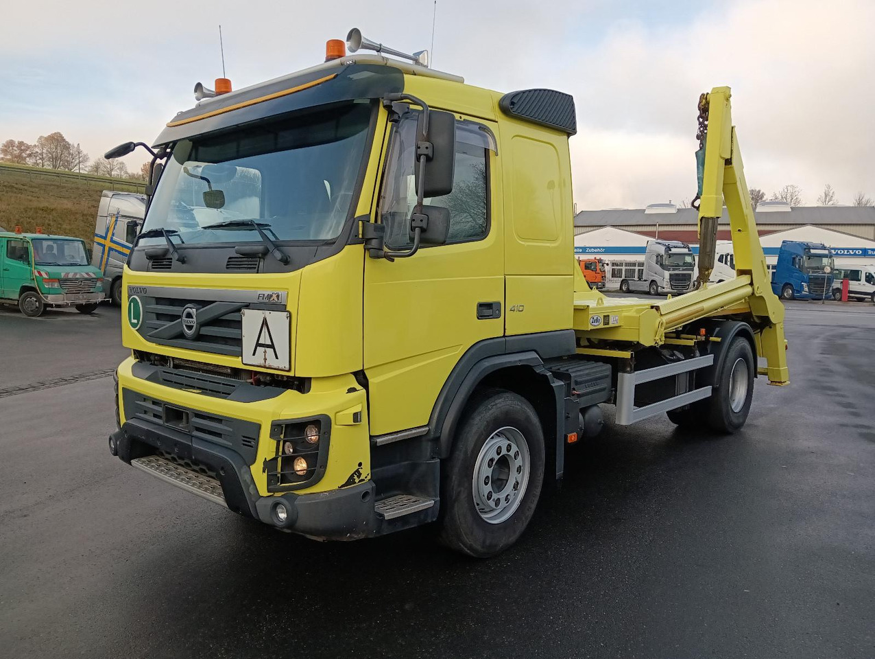 Volvo FMX 410 4x2 MEIER RATIO HAMMER AK13H TOP EUR5 - Skip loader truck: picture 1 Volvo FMX 410 4x2 MEIER RATIO HAMMER AK13H TOP EUR5 - Skip loader truck: picture 1
