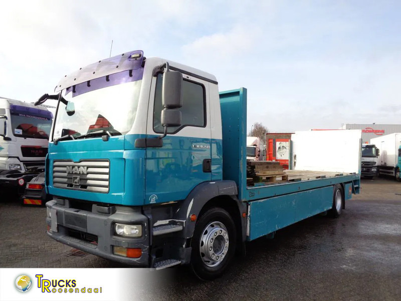 MAN TGM 18.240 + Dhollandia Lift - Dropside/ Flatbed truck: picture 1 MAN TGM 18.240 + Dhollandia Lift - Dropside/ Flatbed truck: picture 1