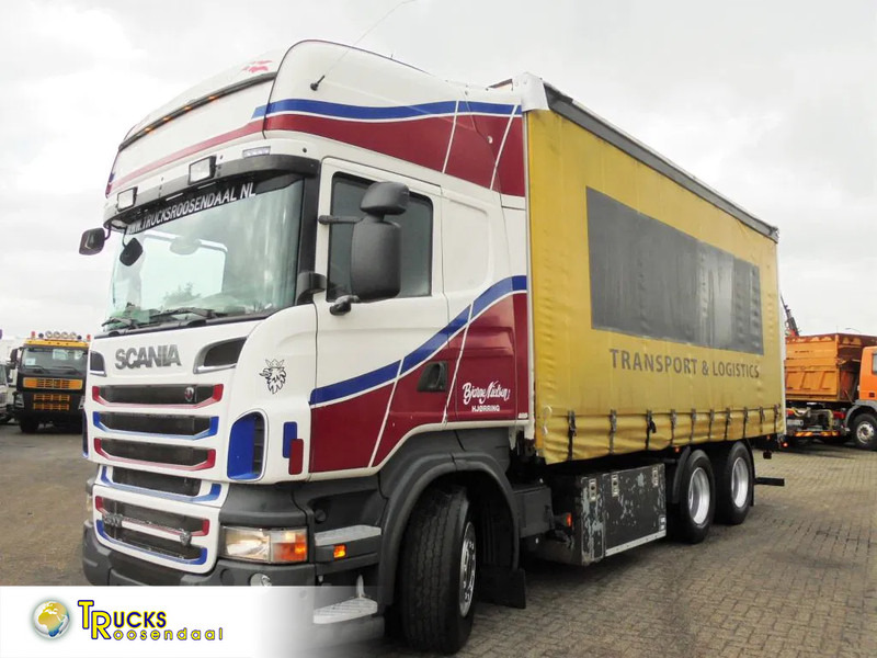 Scania R500 V8 + Euro 5 + Retarder + Lift + 6x2 - Curtainsider truck: picture 1 Scania R500 V8 + Euro 5 + Retarder + Lift + 6x2 - Curtainsider truck: picture 1