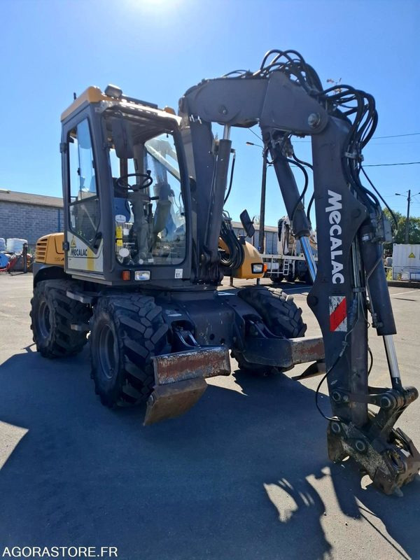 Pelle sur pneus MECALAC 12MTX - N° série  42770 - 2014 - 11400 heures - Excavator: picture 5 Pelle sur pneus MECALAC 12MTX - N° série  42770 - 2014 - 11400 heures - Excavator: picture 5