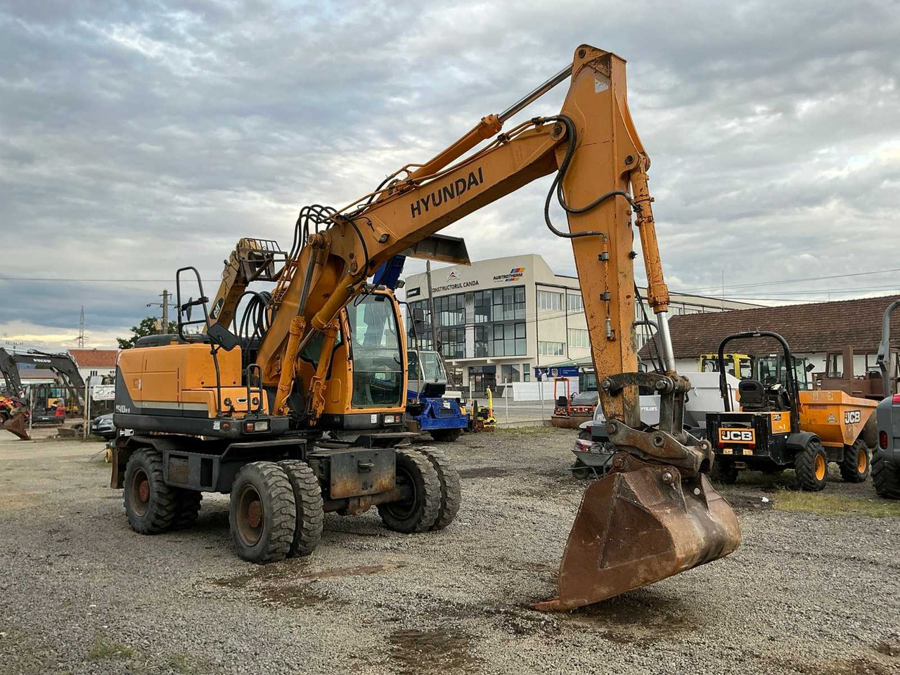 HYUNDAI - ROBEX 140W-9 - WHEELED EXCAVATOR - 2010 - Wheel excavator: picture 1 HYUNDAI - ROBEX 140W-9 - WHEELED EXCAVATOR - 2010 - Wheel excavator: picture 1