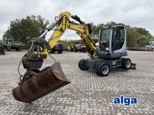 Neuson EW65, Verstellausleger, Hydr. S.W.S.,Div. Löffel - Wheel excavator: picture 1 Neuson EW65, Verstellausleger, Hydr. S.W.S.,Div. Löffel - Wheel excavator: picture 1