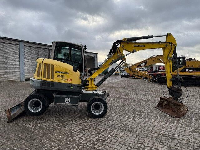 Neuson EW65, Verstellausleger, Hydr. S.W.S.,Div. Löffel - Wheel excavator: picture 5 Neuson EW65, Verstellausleger, Hydr. S.W.S.,Div. Löffel - Wheel excavator: picture 5