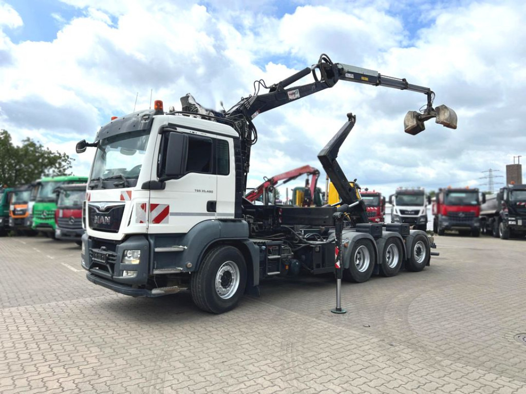 MAN TG-S 35.480 8x4 BL Abrollkipper mit Kran Penz-15L9.80+Meiller RK 30.60L Lenk-Lift Achse - Hook lift truck, Crane truck: picture 1 MAN TG-S 35.480 8x4 BL Abrollkipper mit Kran Penz-15L9.80+Meiller RK 30.60L Lenk-Lift Achse - Hook lift truck, Crane truck: picture 1